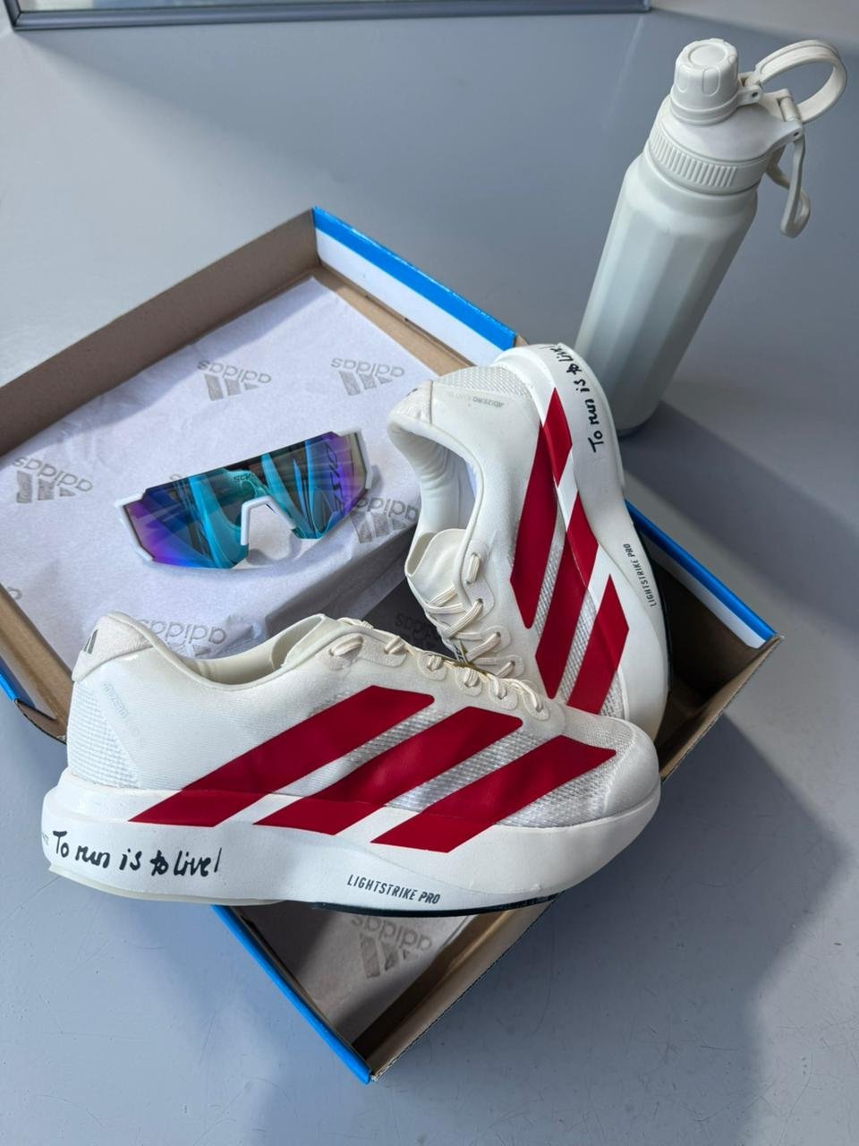 4 Adizero Evo Sl Vermelho - Imagem 1