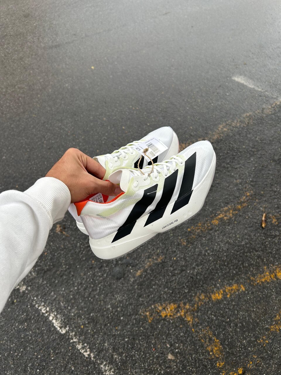 4 Adizero Pro 4 Branco e Preto - Imagem 1